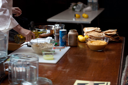 chef-in-residence-garnishing with olive oil